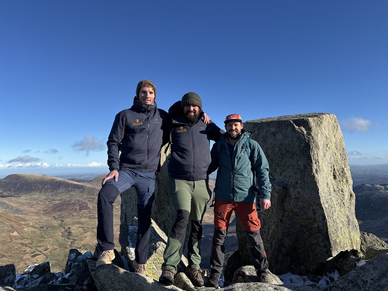 The Wandering Moments co-founders together on a mountain summit in the outdoors